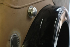 Newly positioned fuel filler cap for the custom-built fuel tank.