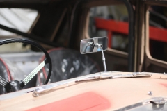 Those original touches make the biggest difference! The dash-mounted rearview mirror reminisces that of the original Riley Kestrel.